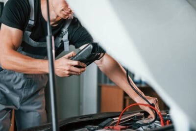 Mobile car electrician working on a vehicle in Melbourne