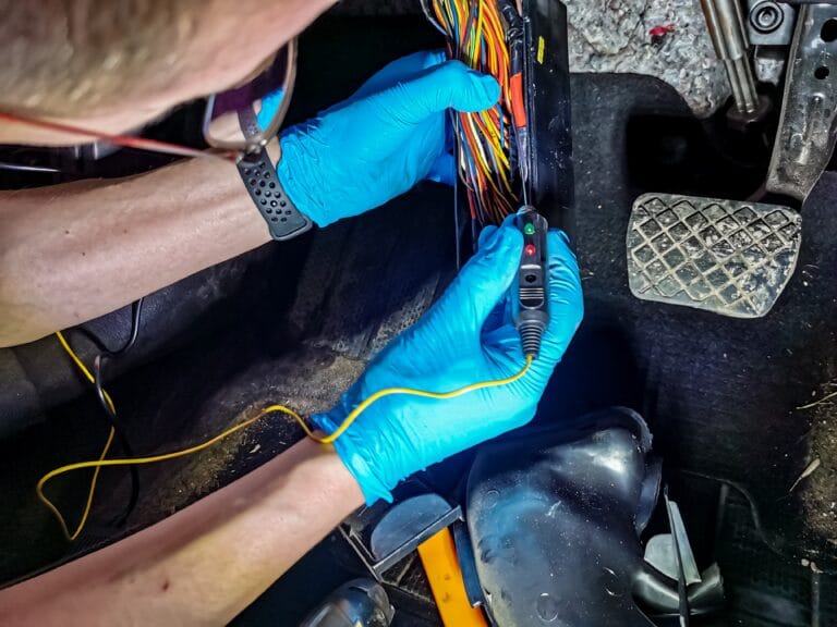 foreman-hands-check-electrical-wiring-in-a-modern-2026-03-09-05-39-18-utc