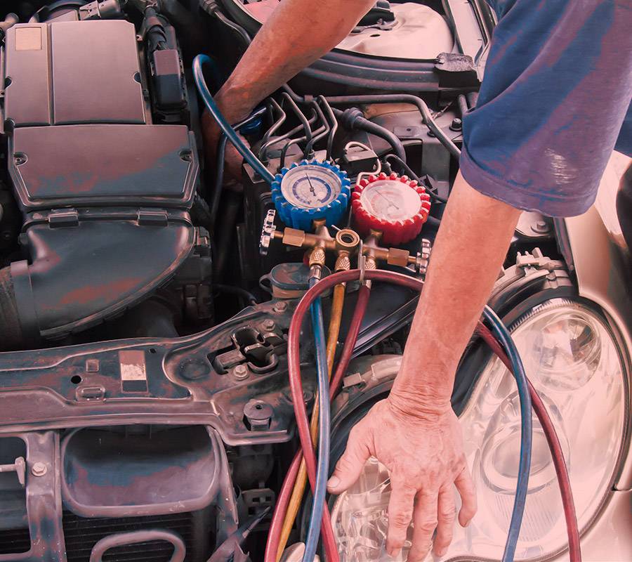 Car air conditioning vent being tested after a regas