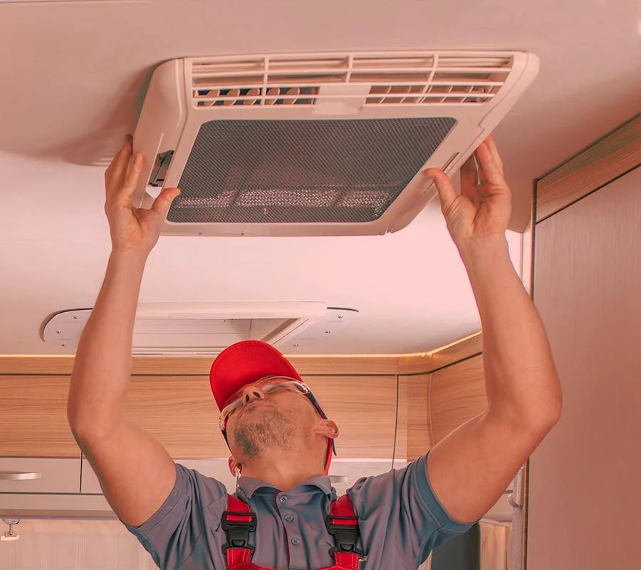 Cabin air filter being replaced during an air conditioning service